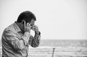 Creative Commons a man on a phone, thinking hard by photoloni_Flickr Creative Commons a man on a phone, thinking hard by photoloni_Flickr