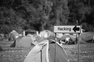 Creative Commons hacking sign in field of tents by Alexandre Dulaunoy_Flickr Creative Commons hacking sign in field of tents by Alexandre Dulaunoy_Flickr