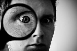 Creative Commons man with magnifying glass by okko pyykko_Flickr Creative Commons man with magnifying glass by okko pyykko_Flickr