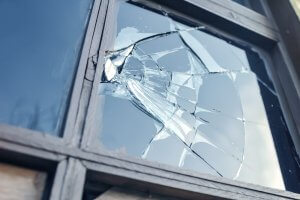 Broken window_Image used under license from Shutterstock Broken window_Image used under license from Shutterstock