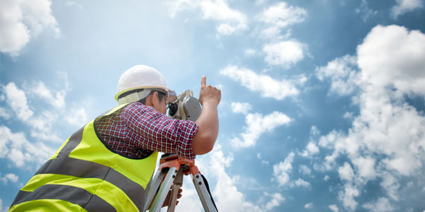 A hard hat can protect you against physical damage, but only surveyors' insurance offers professional protection.