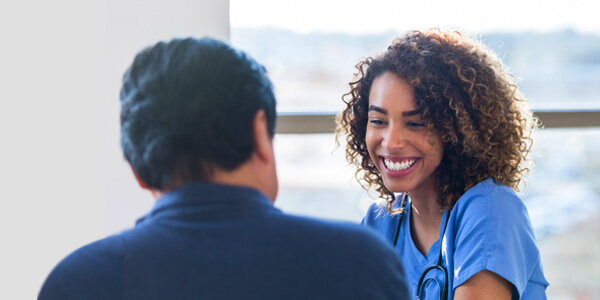 Female nurse meeting patient