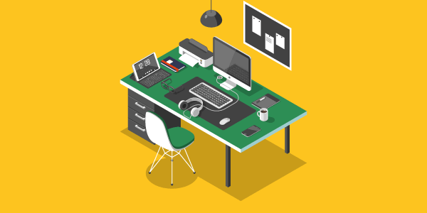 A desk covered in all the gadgets that could be covered by business gadget insurance